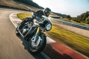 An person riding a motorcycle.
