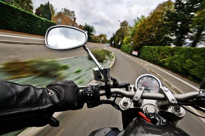 A person riding a motorcycle.